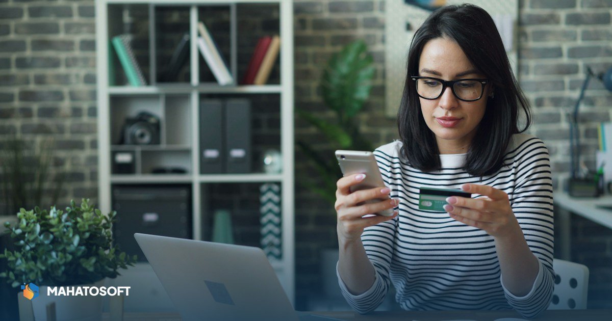 WooCommerce PayPal setup — online store owner completing a card payment at checkout on a laptop